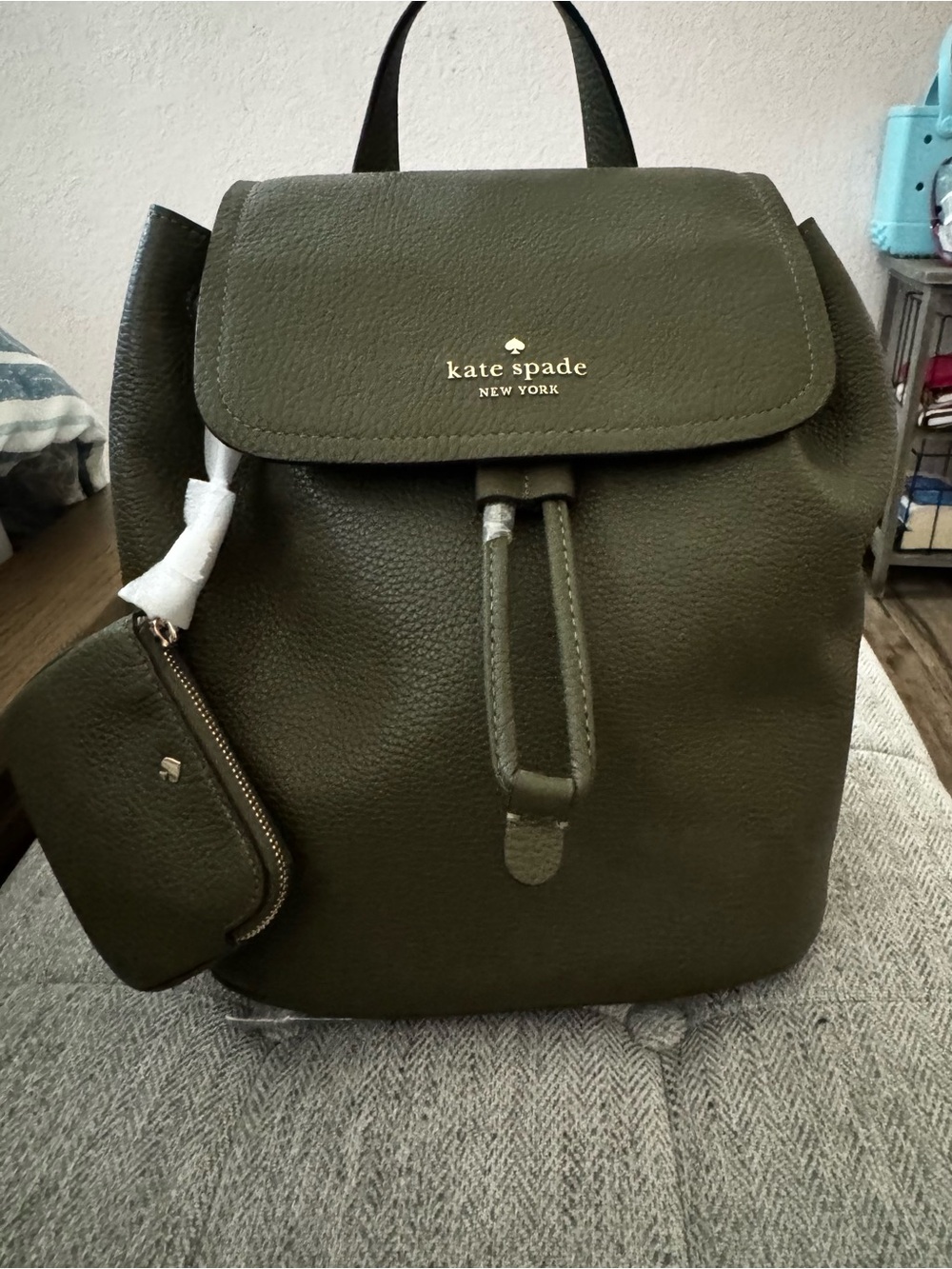 NWT, Kate Spade  pebbled  leather backpack in seaweed.